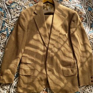 Beautifully crafted vintage suit. Brown and checkered with classic ticket pocket
